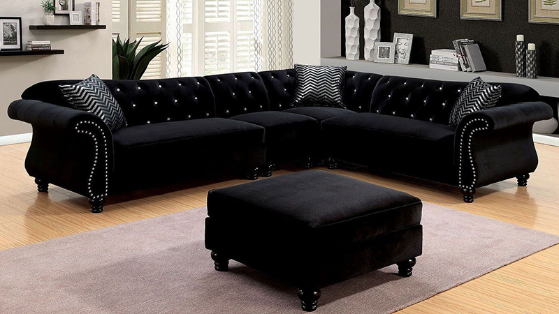 Угловой черный диван с пуфом