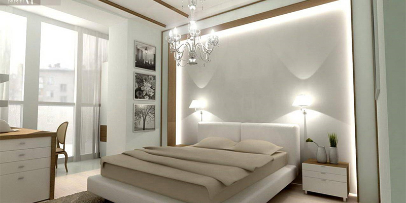 Спальня со спокойными оттенками и кроватью по центру